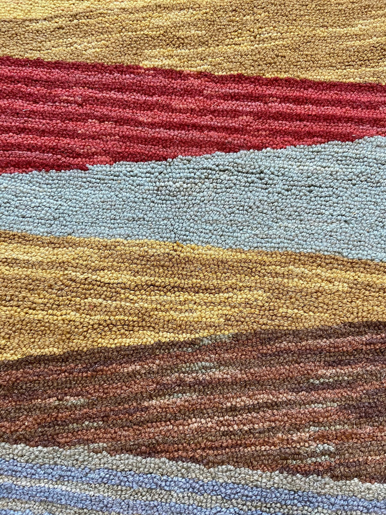 Pinwheel Triangle hand hooked