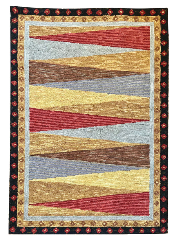 Pinwheel Triangle hand hooked