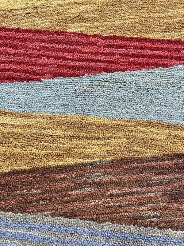 Pinwheel Triangle hand hooked