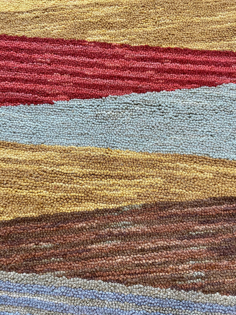 Pinwheel Triangle hand hooked