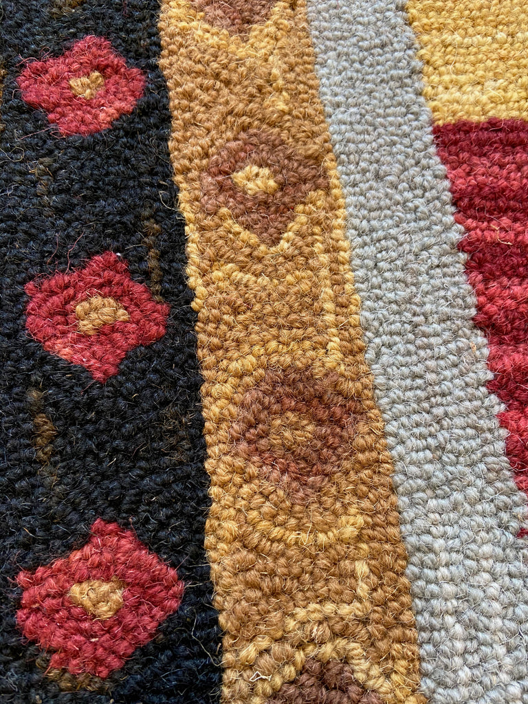 Pinwheel Triangle hand hooked